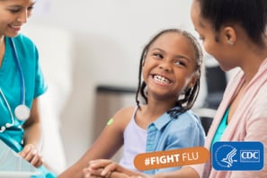 child with health care professional and parent smiling with text: #figtflu and cdc logo
