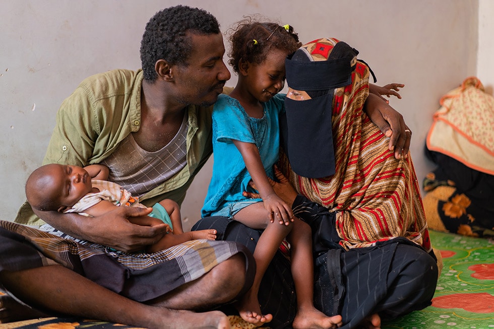 A Yemeni family (father, mother, young daughter and infant son).