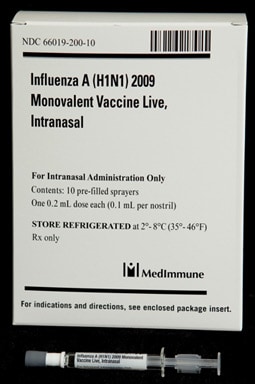 Picture of box of 10 pre-filled sprayers of Live Intranasal Influenza A (H1N1) 2009 Monovalent Vaccine with sprayer in front
