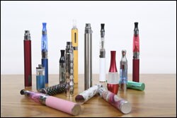 The figure above is a photograph of various e-cigarettes and hookahs.