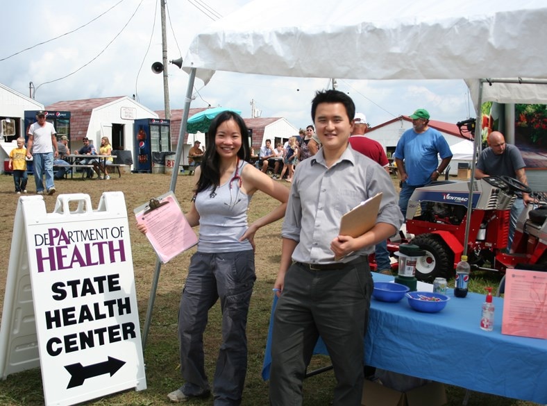 State department health care workers at a health care tent.