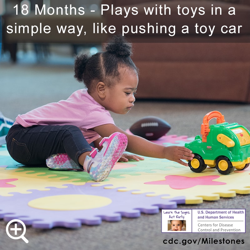 Plays with toys in a simple way, like pushing a toy car