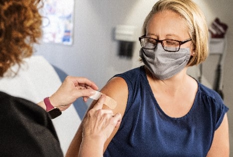 Woman getting a vaccine