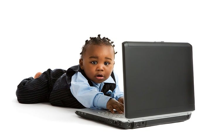 A baby using a computer