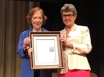 Dr. Coleen Boyle presented Rosalyn Carter with a gift to acknowledge her dedication to mental health work for over four decades.