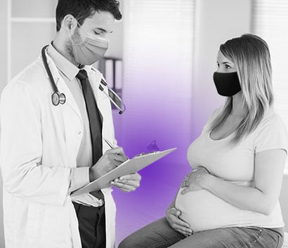 photo of a doctor with a pregnant woman