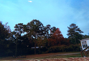 15_0062_t2.jpg Photo of a house with no sidewalk in front