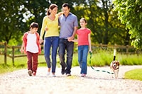 Image of a family walking