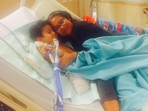 Francisco in the hospital with his mom.