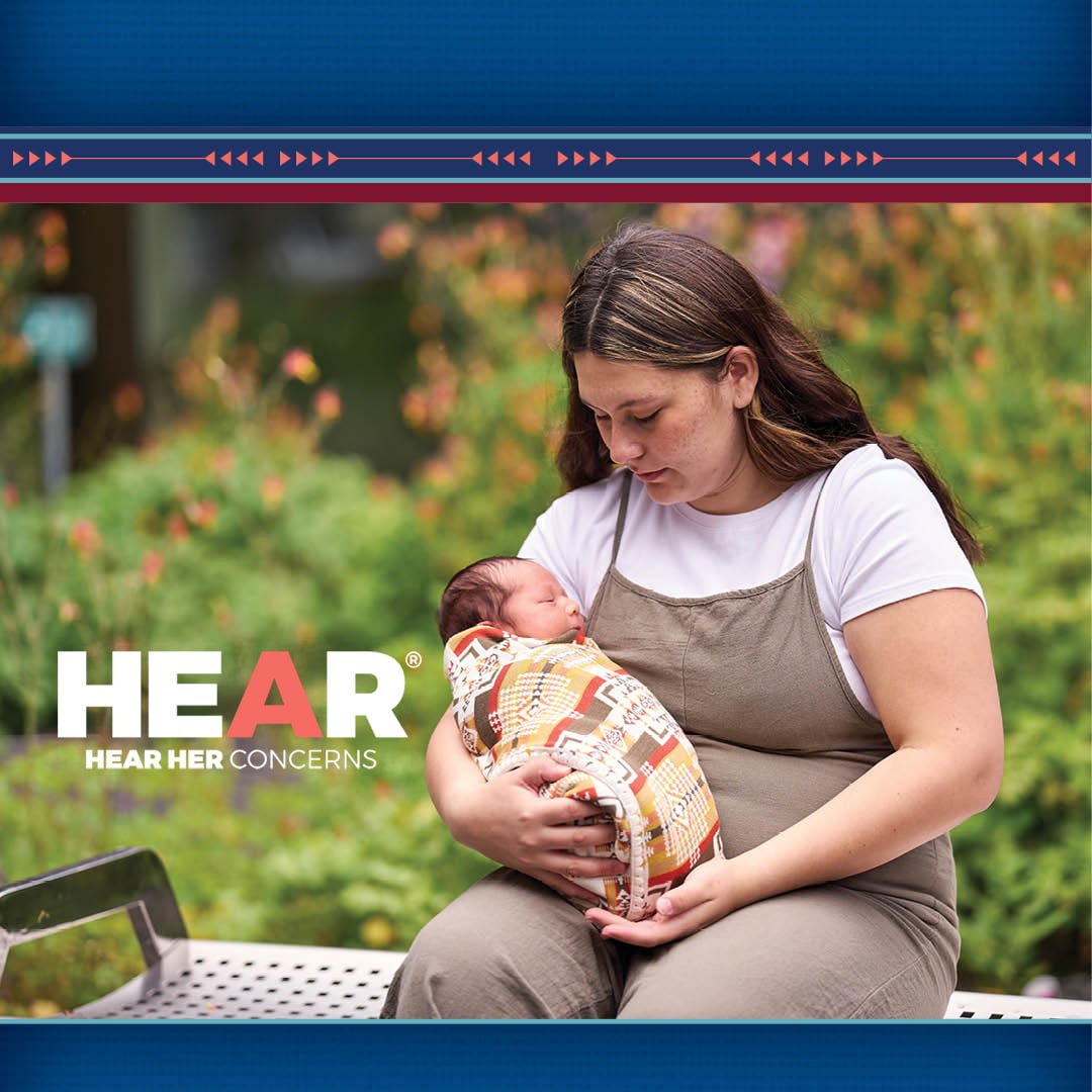 Hear Her Concerns woman holding baby