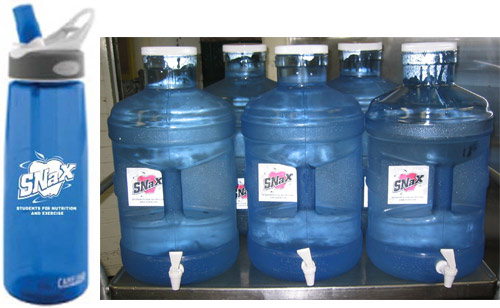 The first picture shows one of the reusable water bottles that was distributed to all students and staff. The second picture shows 5-gallon dispensers that are filled with filtered, chilled tap water.
