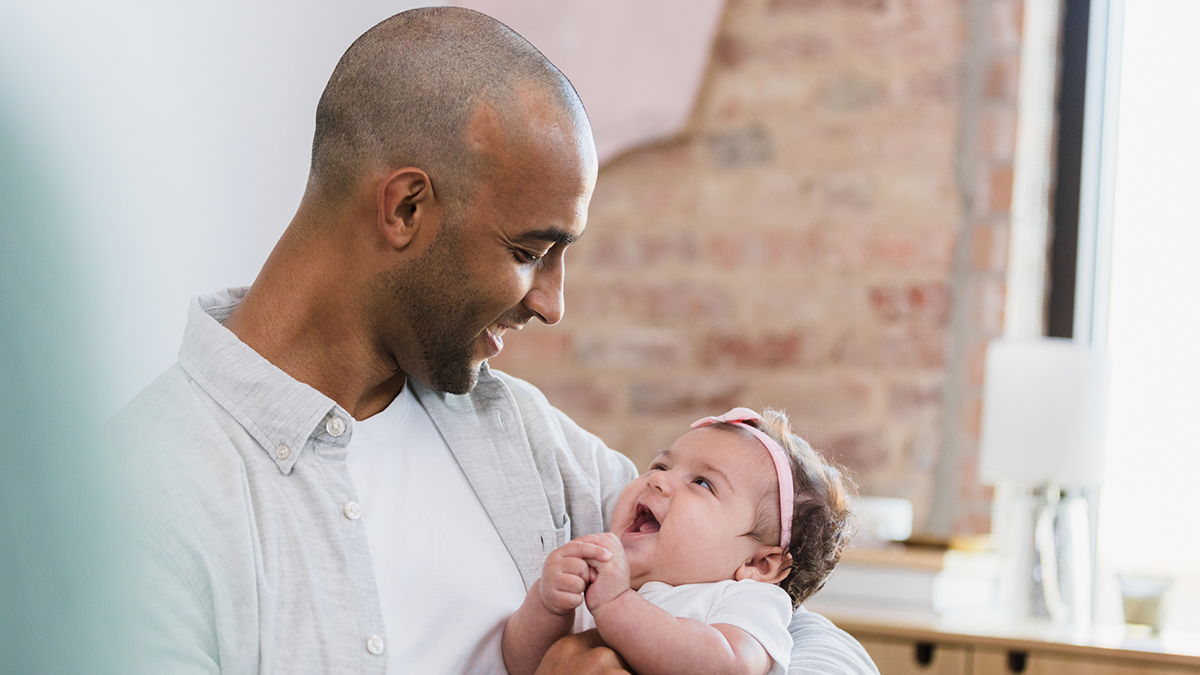 Dad holding baby
