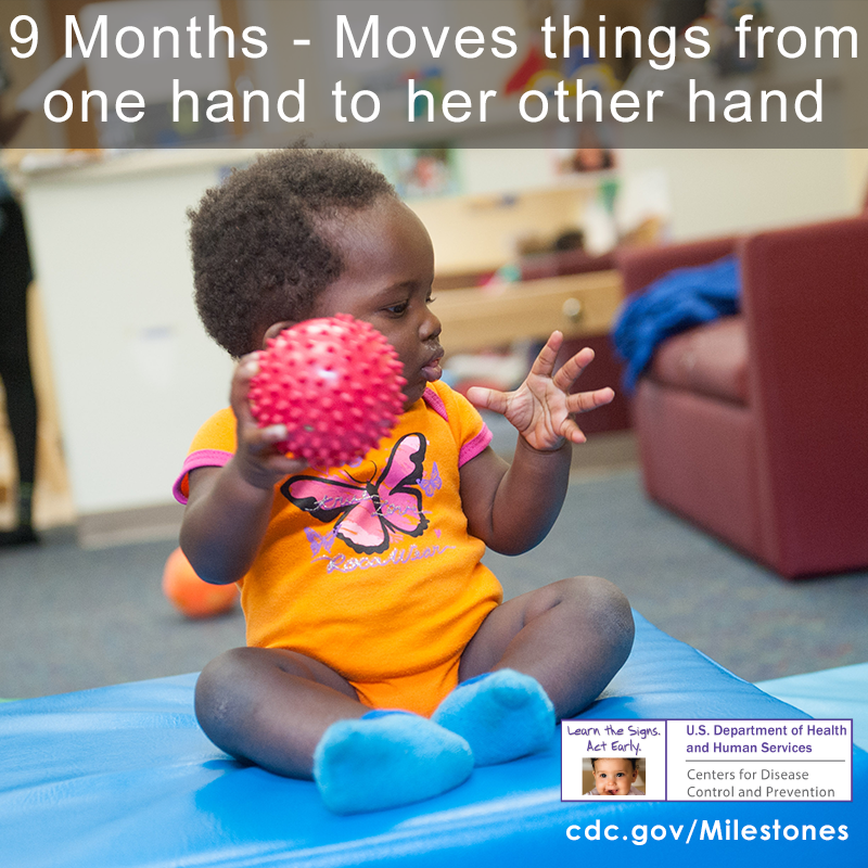 9 Months_Moves things from one hand to the other