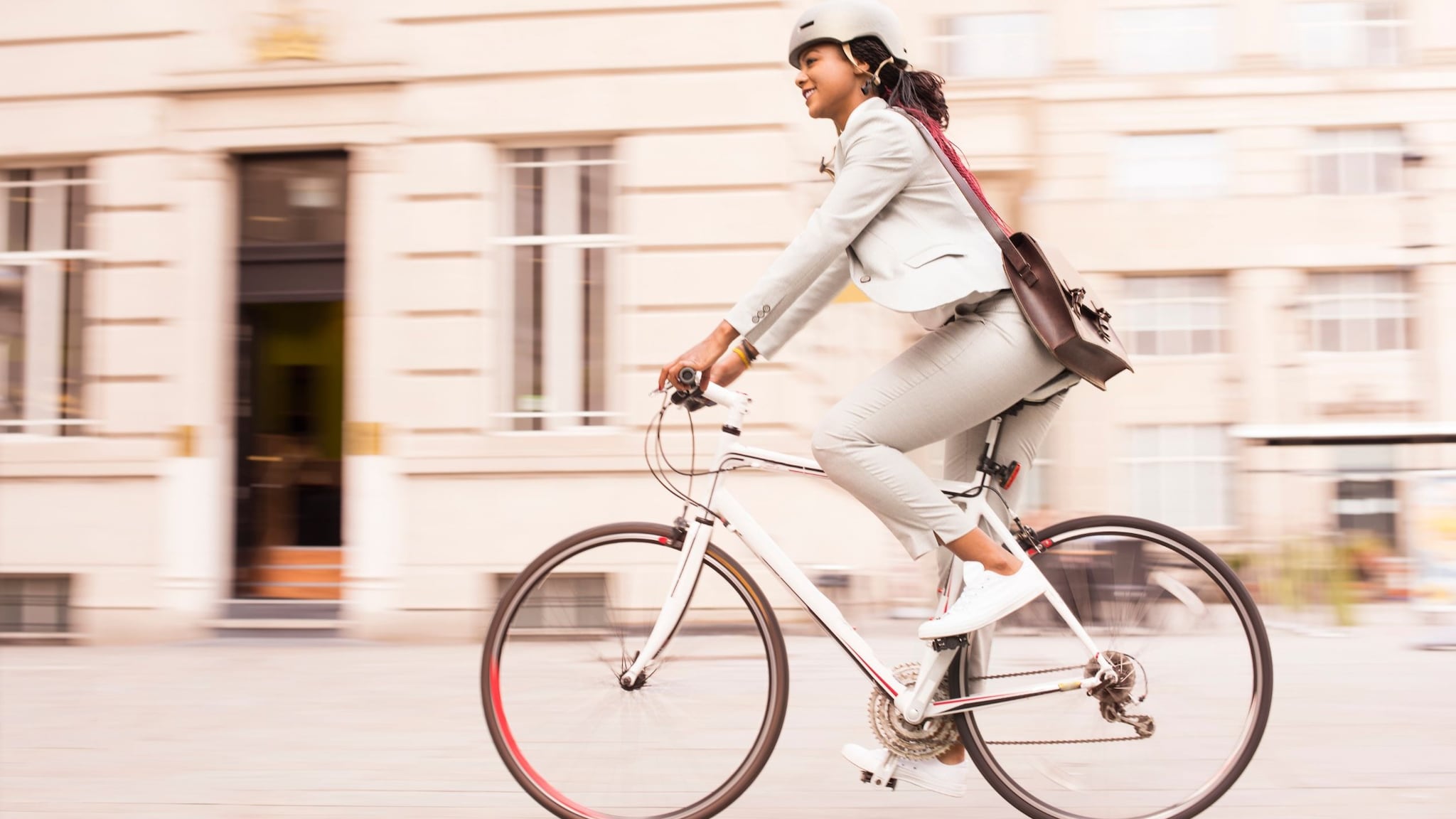 Woman biking to work.