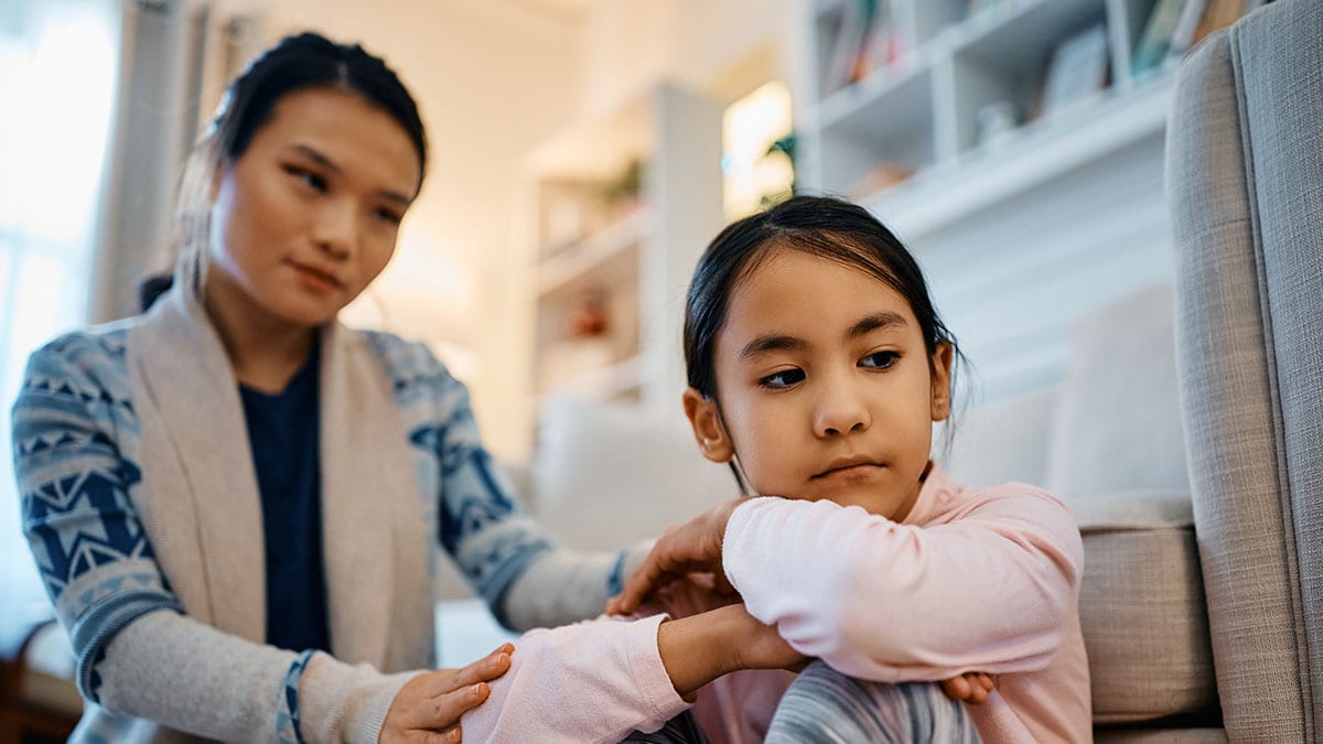 Mom talking with frustrated daughter