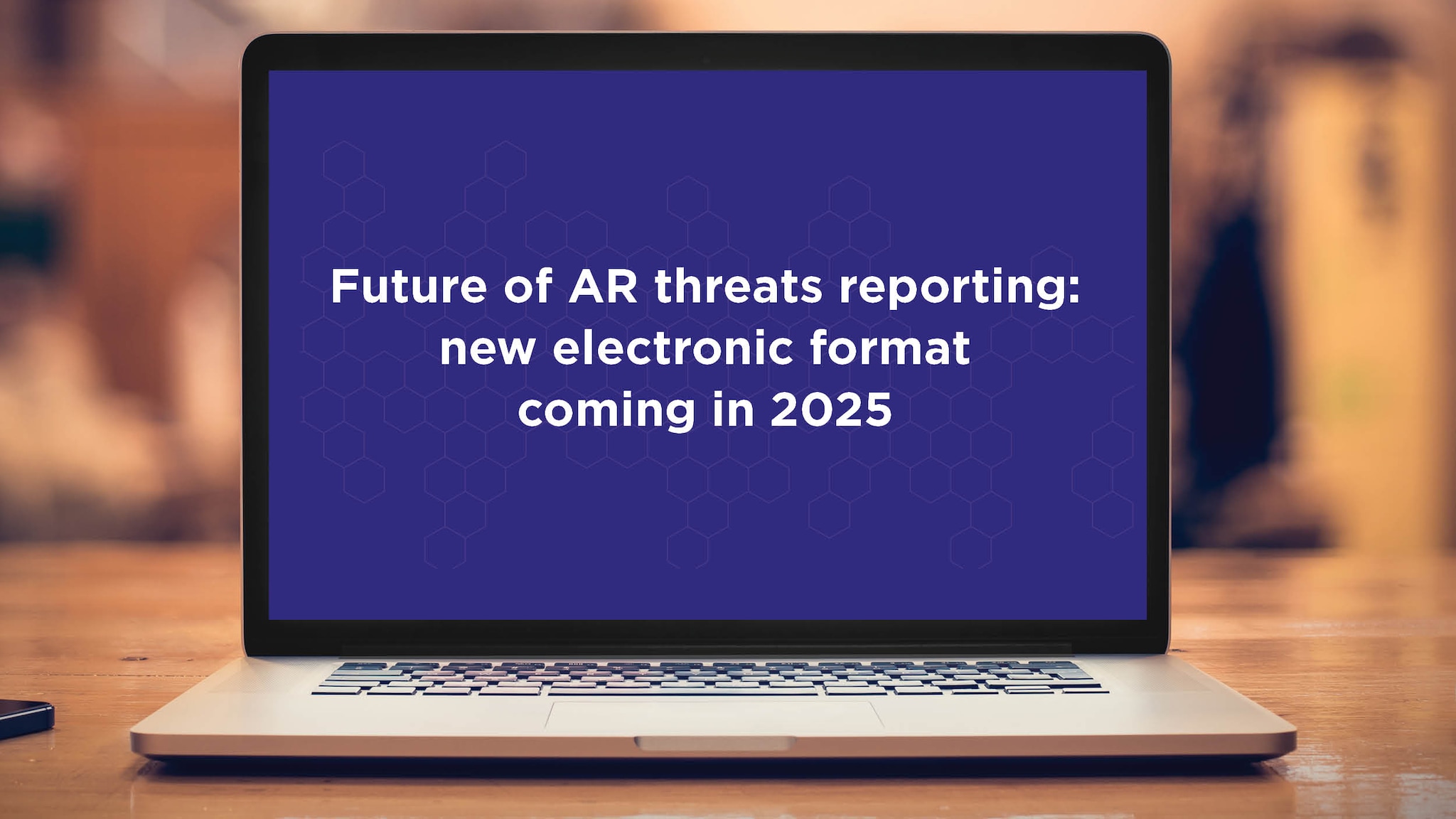 Laptop computer showing message: Future of AR Threats Reporting: New electronic format coming in 2025