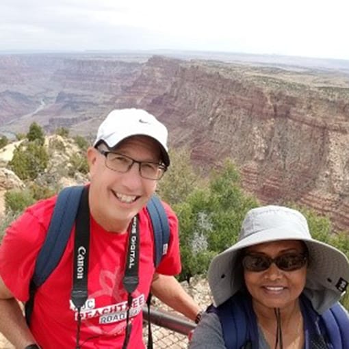 Photo of Rob and Qaiser stopping for a quick #SunSafeSelfie while exploring the Grand Canyon.