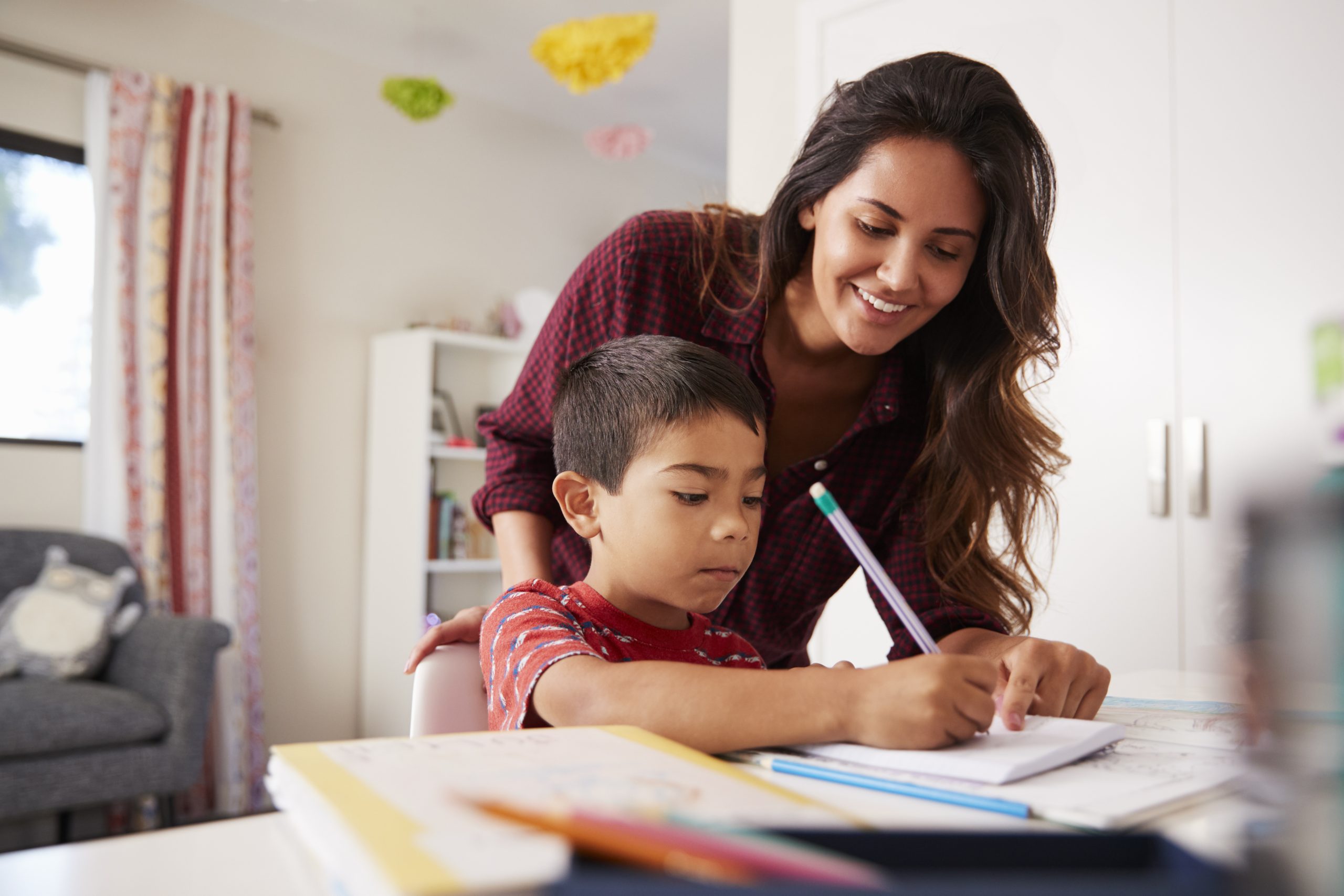 Mother and child doing homework