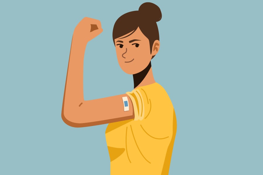 Woman flexing her arm to show off vaccination bandage.
