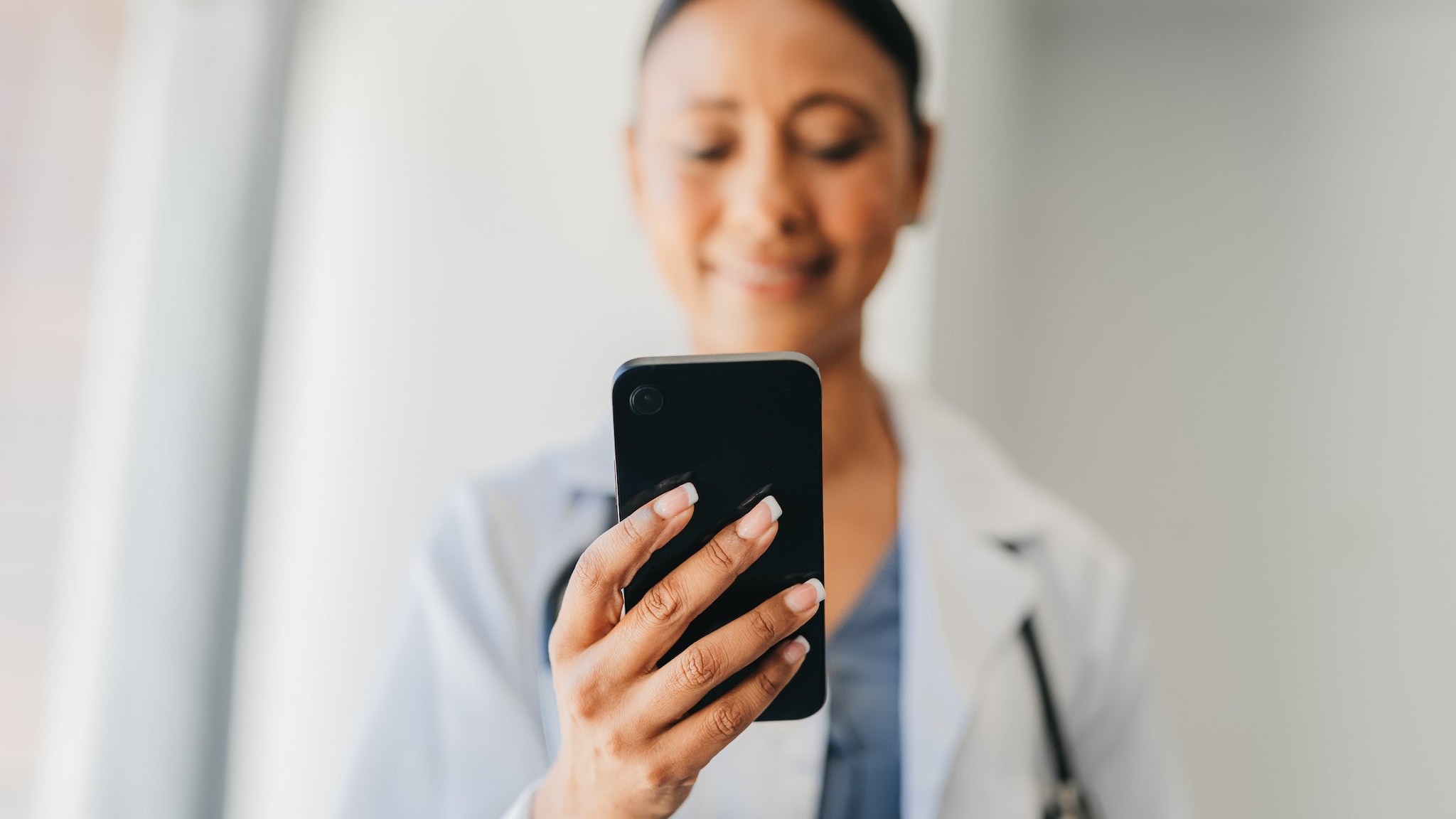 A health care provider following up with a patient by phone