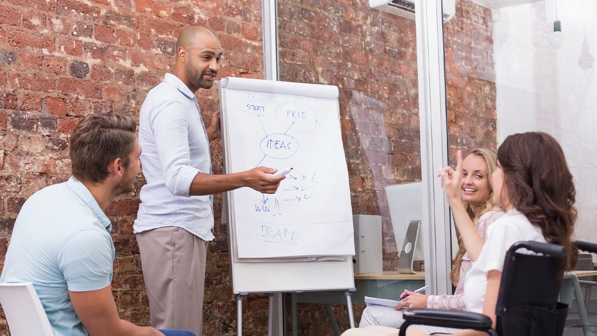 Businessman making a presentation to his fellow coworkers