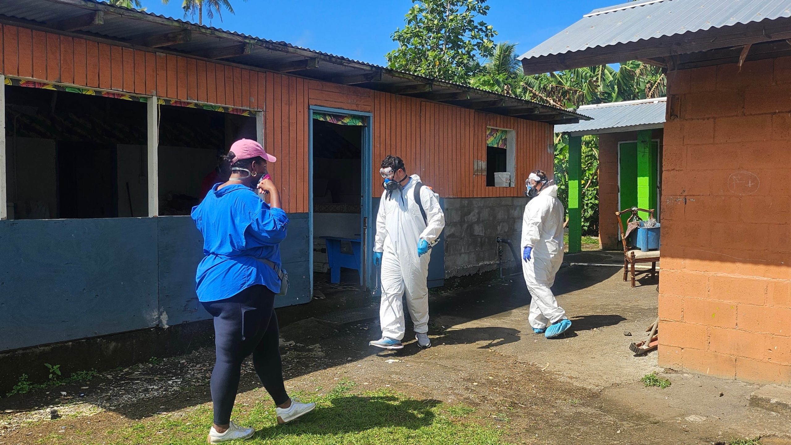 EIS Officer Fhallon Ware-Gilmore (Class of 2023) providing recommendations and reviewing indoor residual spraying techniques conducted by the American Samoa Environmental Health Division.