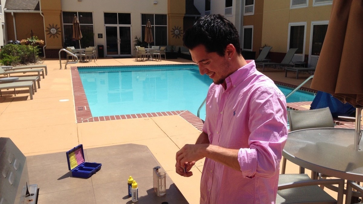NEPHIP intern Kyle taking a pool sample.