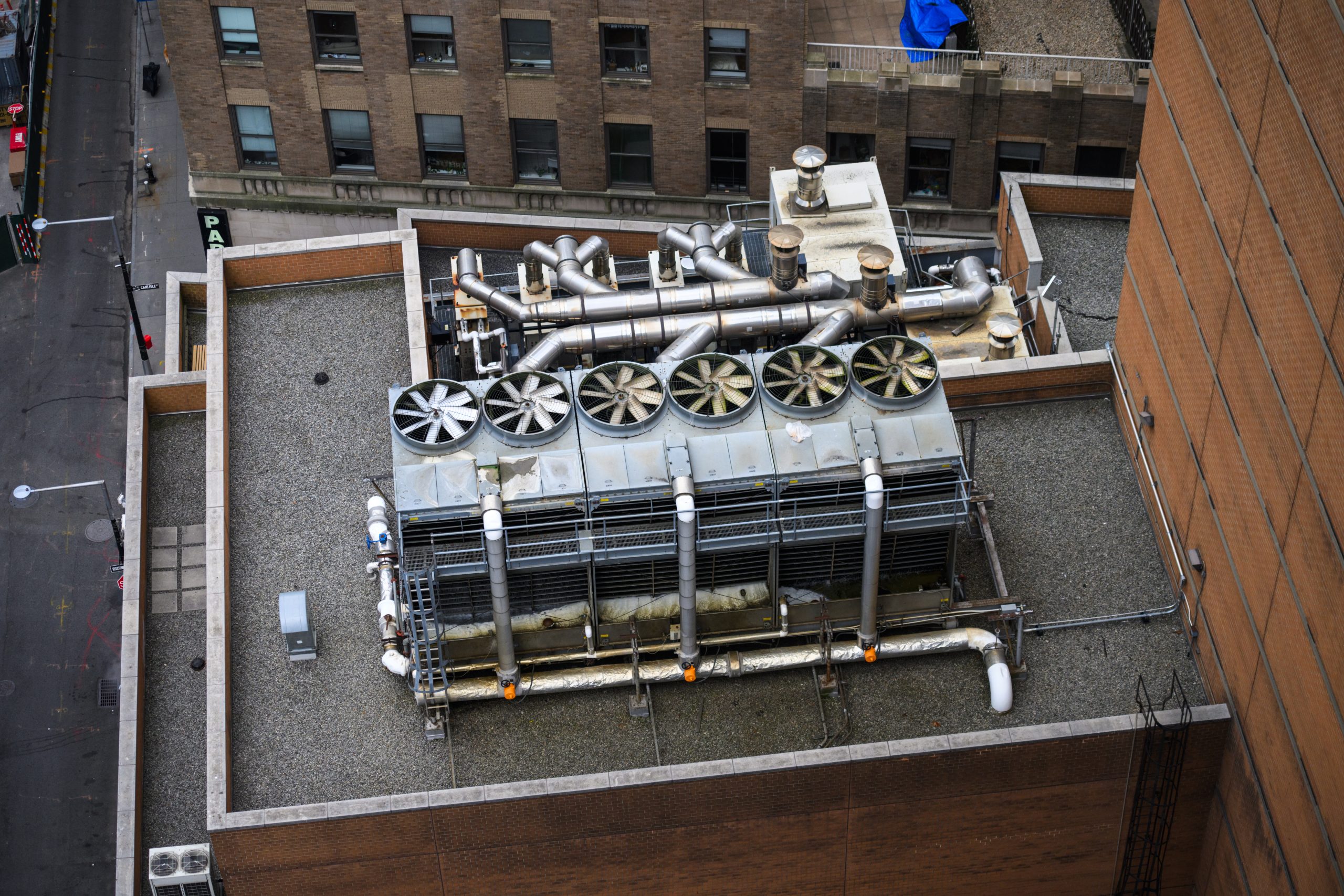 Ventilation fans on top building.
