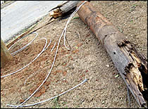 disasters_poweroutage04_210px power pole on the ground