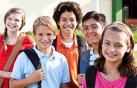 Group of preteens smiling