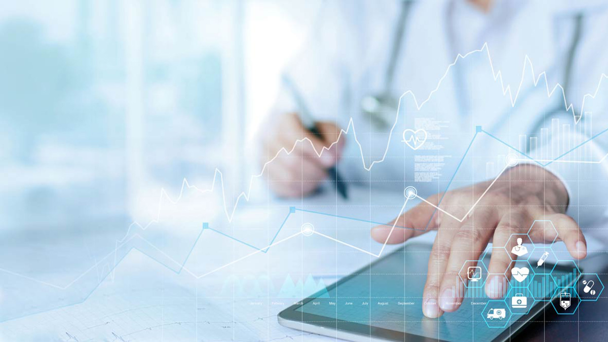 person using tablet to see how CDC classifies flu severity