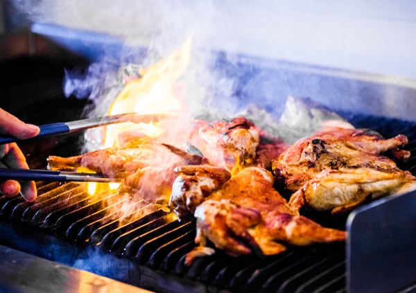 Chicken grilling on a grill