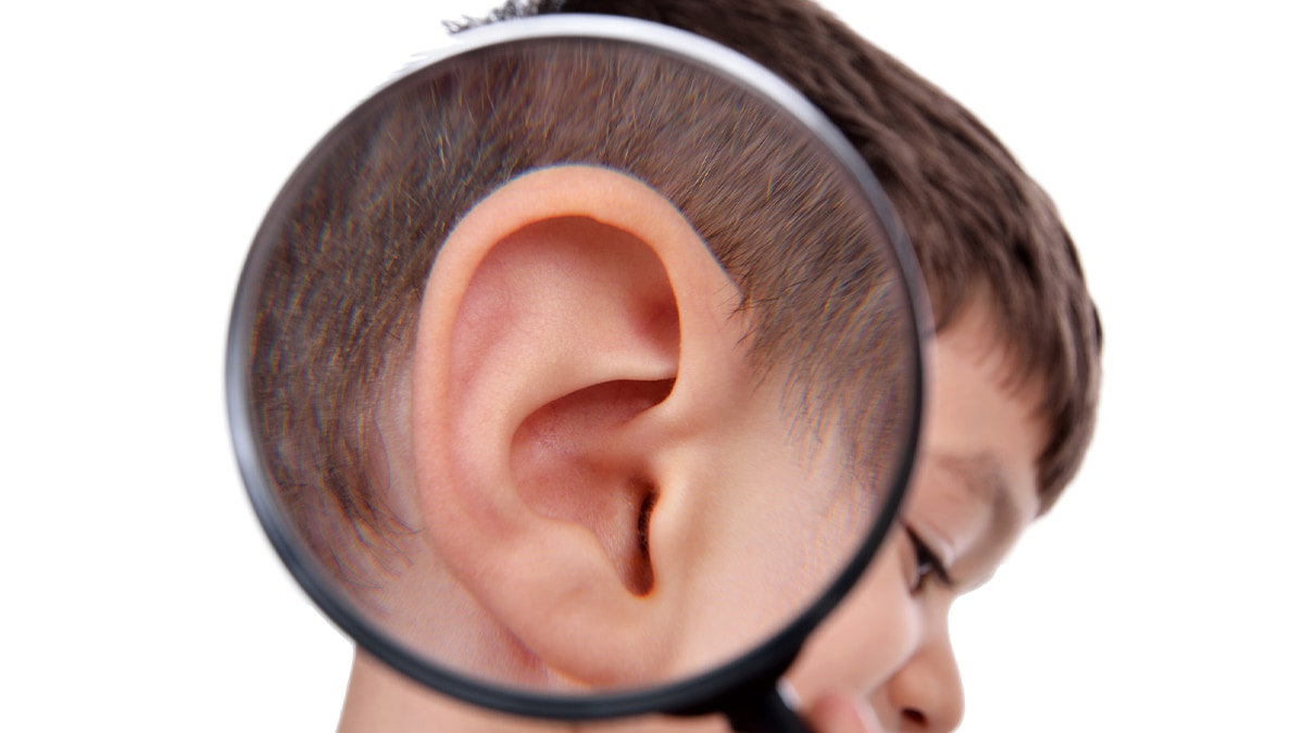 enlarged ear with magnifying glass