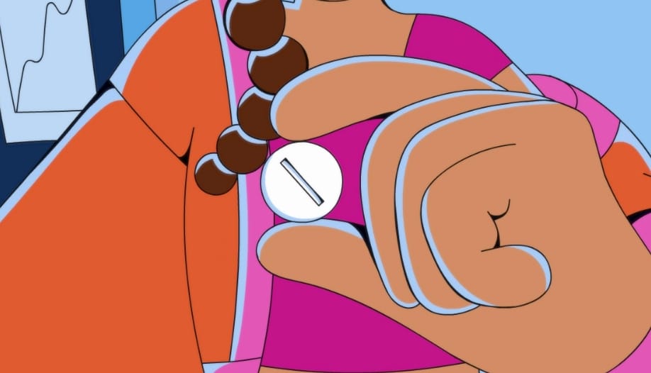 A person holding a pill in their hand