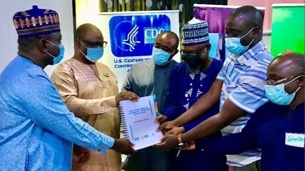 Official presentation of new PHEM Intermediate Participants’ Training Manual to Lagos State Director of Surveillance, Epidemiology & Health Security