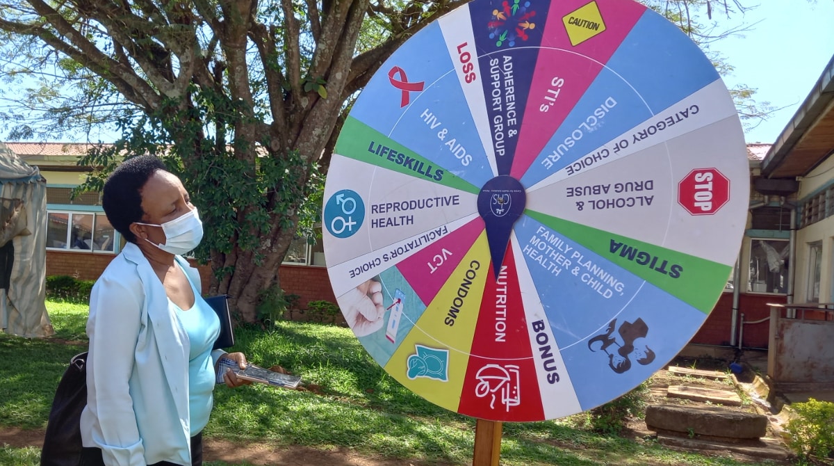 Colorful wheel displaying HIV literacy terms for adolescents and young people