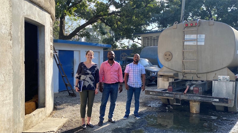 CDC WASH Specialist Taylor Osborne (left) met with Teddy Laroche (center) and Evenel Thermidor (right) from the National Directorate of Drinking Water and Sanitation and the Regional Office of Drinking Water and Sanitation in the North to assess whether the community has access to safe drinking water