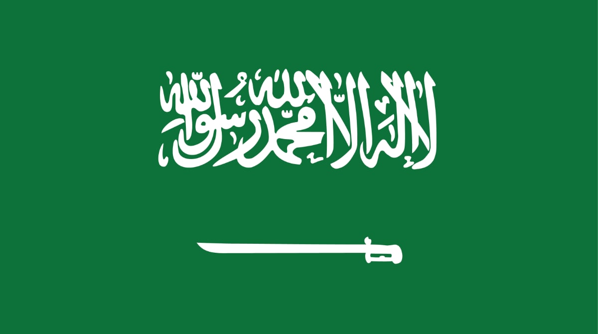 Green flag with white sword illustration in the middle and arabic text.
