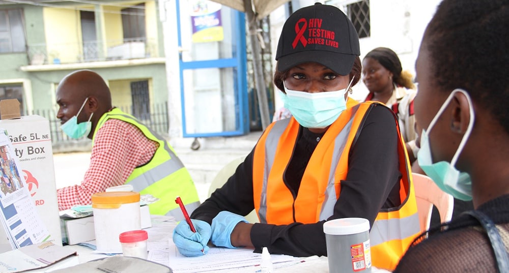 A young person gets an HIV test at an open-air testing site in the Rivers State.