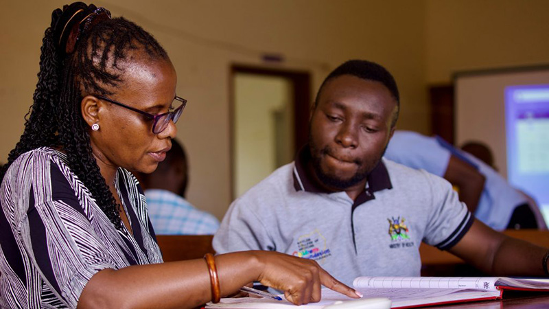 Man and woman review documents.