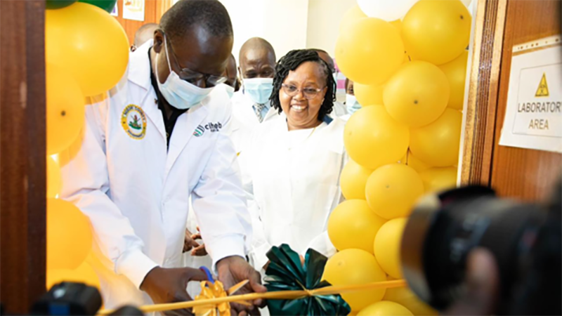 Kenya laboratory staff in ribbon cutting ceremony.
