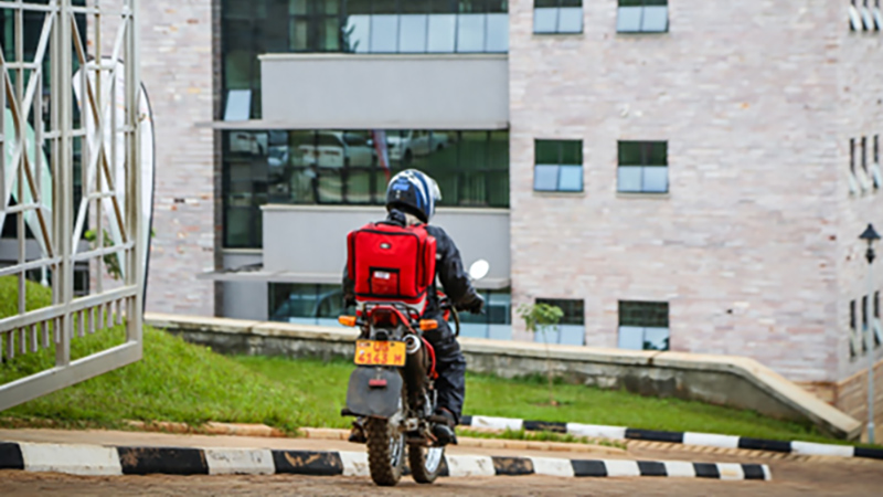 A rider delivering samples to the Uganda national reference lab for testing.