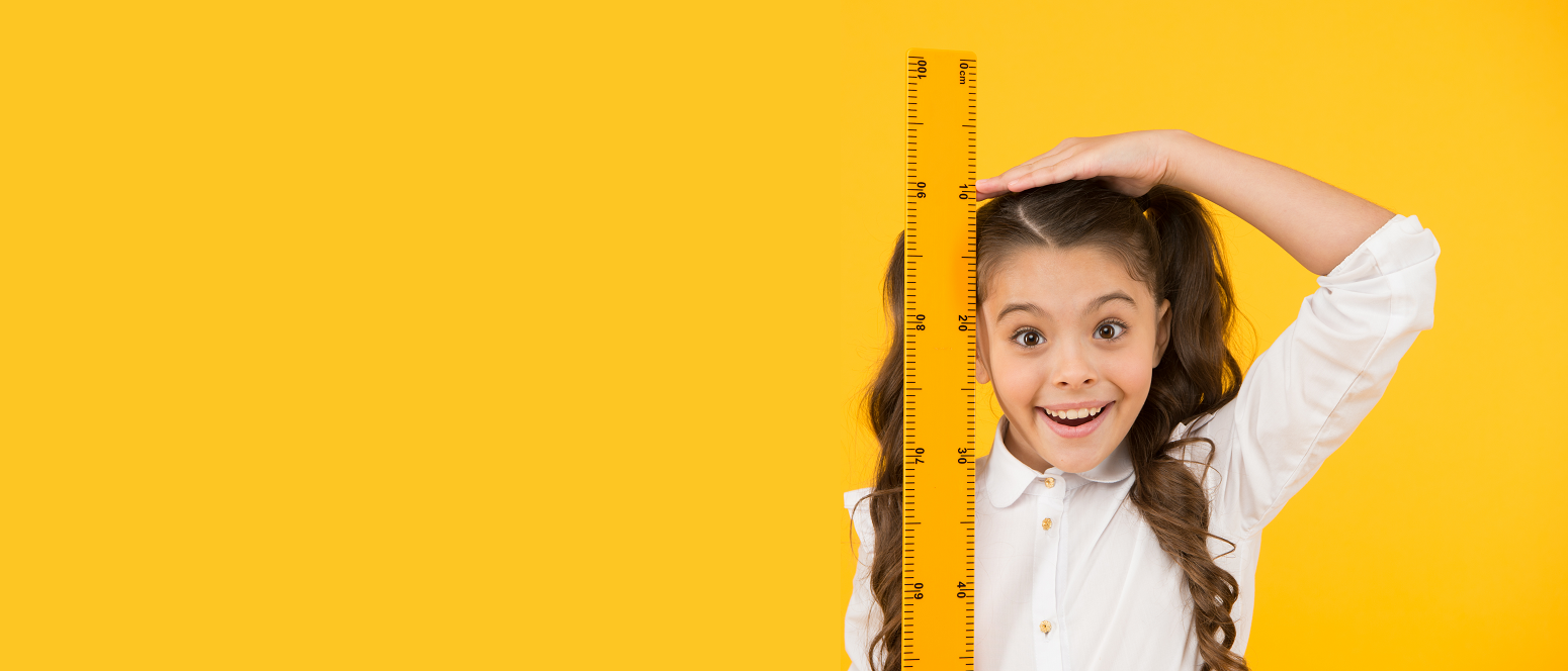 CDC Growth Charts Image of girl with measuring stick