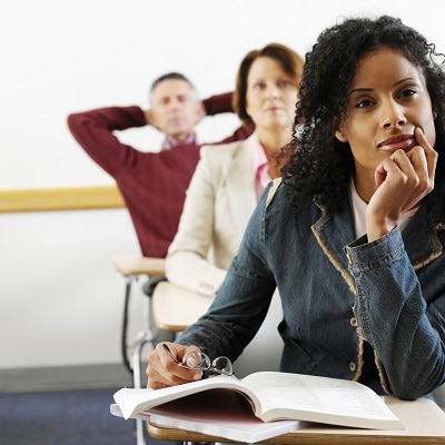 Adults learning about health in an adult education classroom.