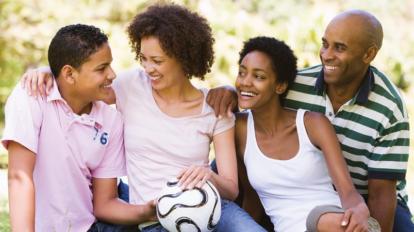 Parents together with two teens