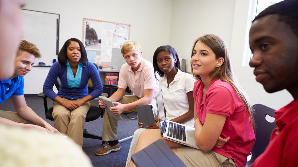 High school students taking parting talking in the group discussion about sexual health education.