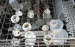 sanitizing bottles in dishwasher