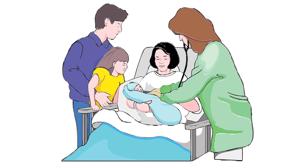 A doctor checks on an infant who is in his mother's arms while the rest of the family looks on.