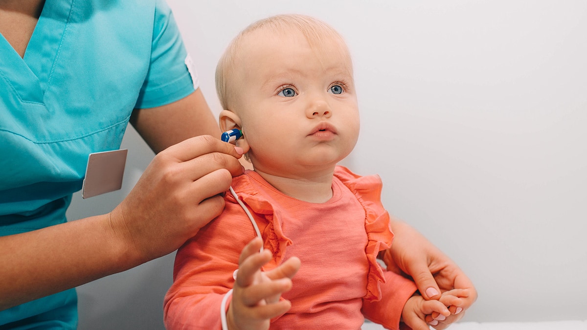 Infant getting hearing test