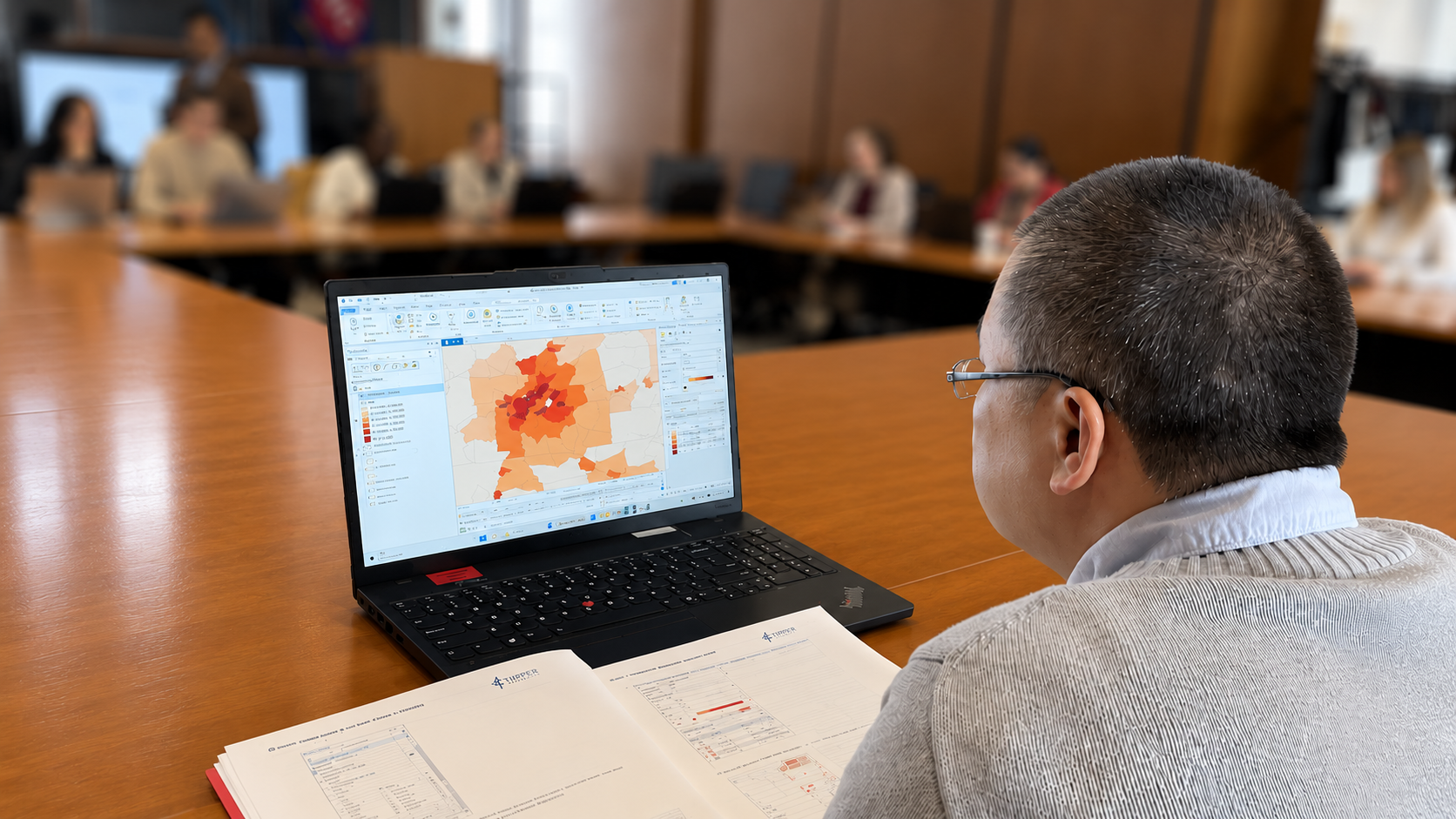 Man taking GIS training on his laptop.